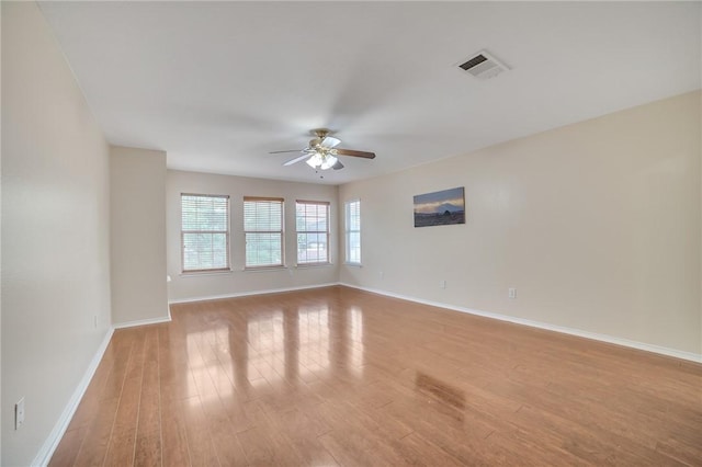 11228 Pickard Ln, Austin, TX 78748 - spare room with a ceiling fan, baseboards, and light wood-style floors