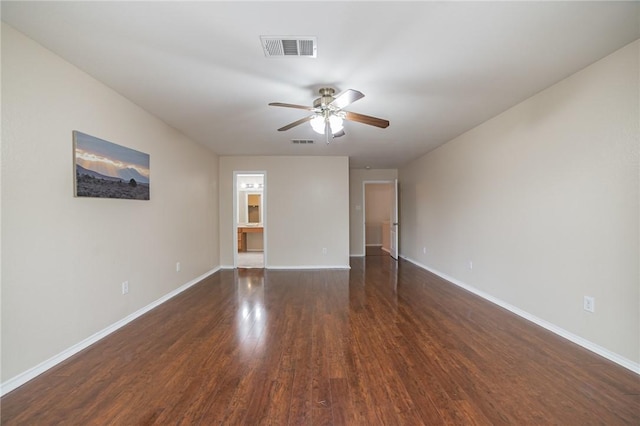 11228 Pickard Ln, Austin, TX 78748 - unfurnished room featuring ceiling fan, dark wood-style flooring, and baseboards