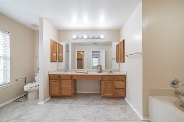 11228 Pickard Ln, Austin, TX 78748 - full bathroom featuring double vanity, plenty of natural light, toilet, and a tub