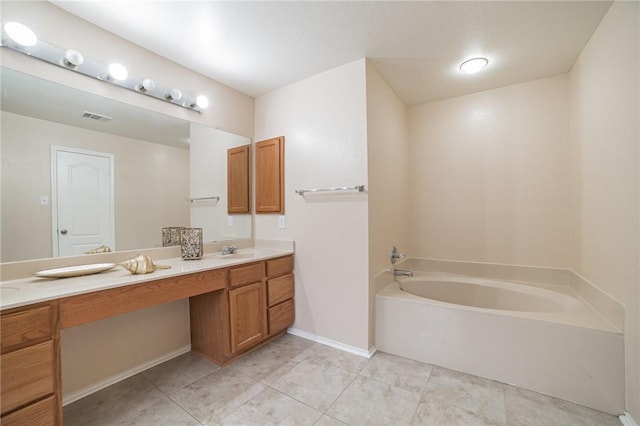 11228 Pickard Ln, Austin, TX 78748 - bathroom with double vanity, a bath, tile patterned floors, and baseboards