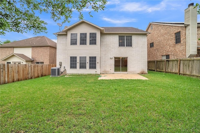 11228 Pickard Ln, Austin, TX 78748 - back of property with central AC, a patio area, and brick siding