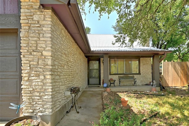 507 W Dittmar Rd, Austin, TX 78745 - property entrance with metal roof and brick siding