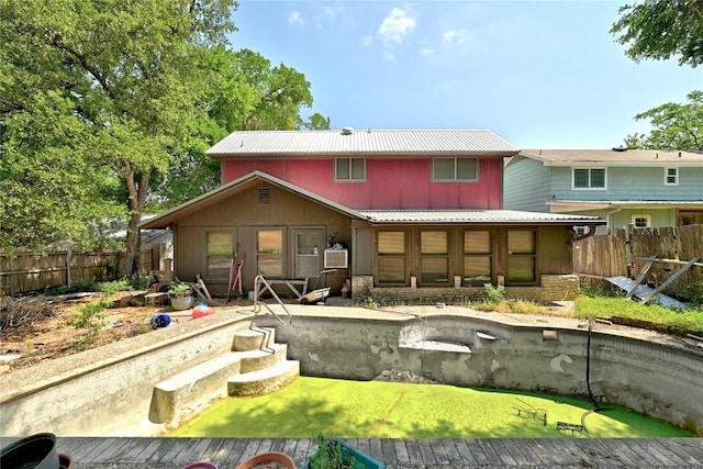 507 W Dittmar Rd, Austin, TX 78745 - back of house with board and batten siding and metal roof