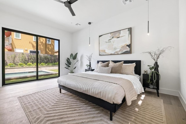 2106 Thornton Rd, Austin, TX 78704 - bedroom with access to exterior, wood finished floors, baseboards, and a ceiling fan