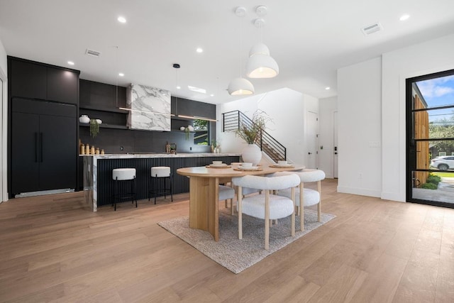 2106 Thornton Rd, Austin, TX 78704 - dining area featuring light wood-style flooring, recessed lighting, and baseboards