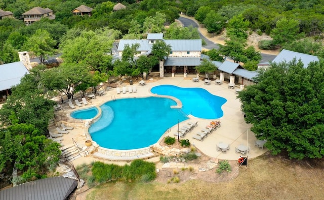 6712 Lantern View Dr Unit 303, Jonestown, TX 78645 - community pool with a patio area