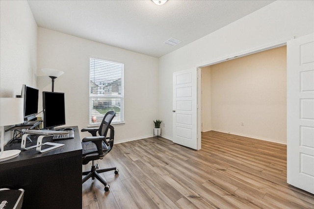 7008 Daniel Ranch Dr, Austin, TX 78744 - office space with light wood-type flooring and baseboards