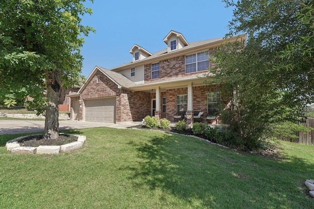 504 Chaparral Dr, Leander, TX 78641 - craftsman-style home with brick siding, a porch, a garage, and driveway