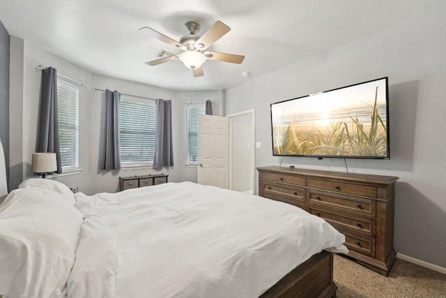 504 Chaparral Dr, Leander, TX 78641 - bedroom featuring carpet flooring, baseboards, and a ceiling fan