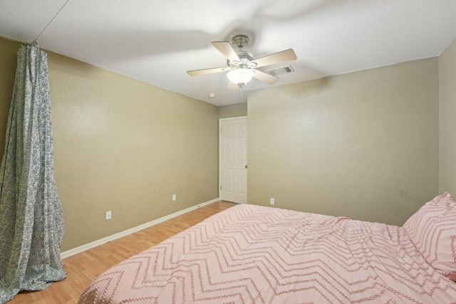 504 Chaparral Dr, Leander, TX 78641 - bedroom featuring light wood-type flooring, baseboards, and ceiling fan