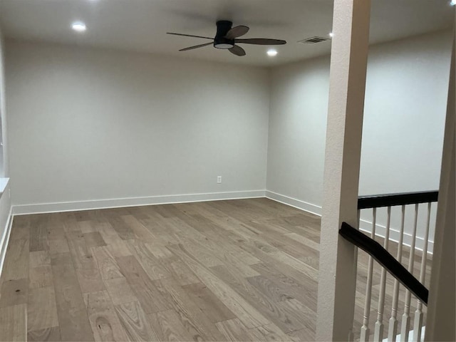117 Waterloo Dr, Kyle, TX 78640 - empty room with a ceiling fan, wood finished floors, and recessed lighting