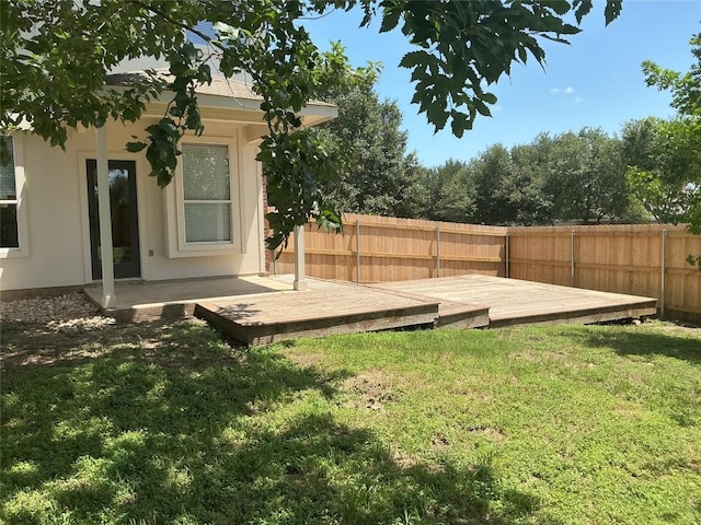 117 Waterloo Dr, Kyle, TX 78640 - fenced backyard with a wooden deck
