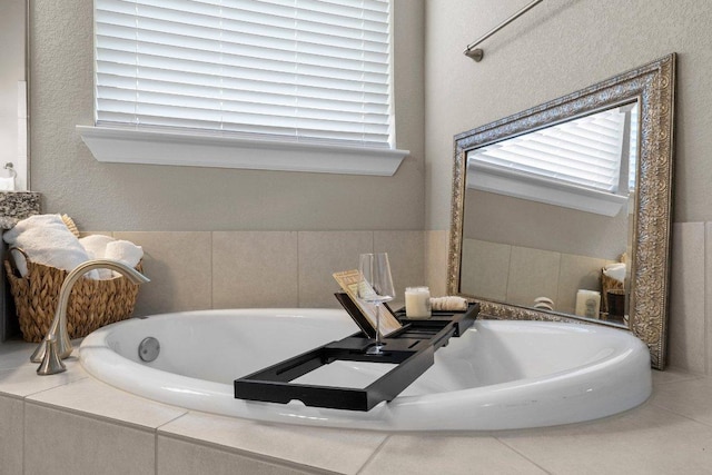 3328 Balboa Way, Round Rock, TX 78665 - bathroom featuring plenty of natural light and a garden tub