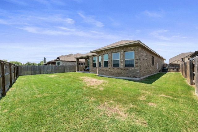 3328 Balboa Way, Round Rock, TX 78665 - back of house featuring brick siding and a fenced backyard