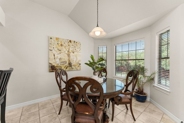 202 Dunkeld Dr, Spicewood, TX 78669 - dining space with plenty of natural light, lofted ceiling, baseboards, and light tile patterned floors