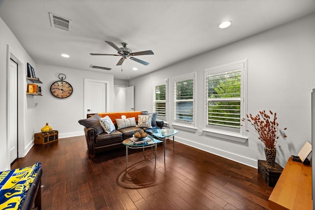 2100 E 10th St, Austin, TX 78702 - living room featuring baseboards, a ceiling fan, recessed lighting, and wood-type flooring