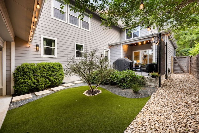 2100 E 10th St, Austin, TX 78702 - back of house featuring a patio and a gate