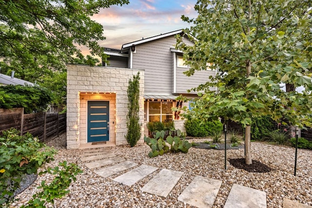 2100 E 10th St, Austin, TX 78702 - view of front facade featuring stone siding
