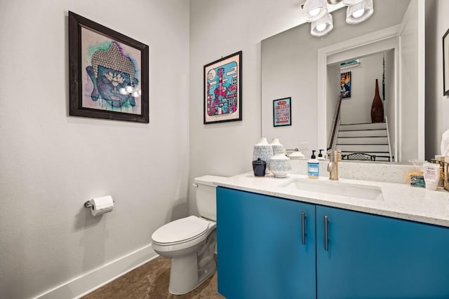 2100 E 10th St, Austin, TX 78702 - half bath featuring toilet, vanity, and baseboards