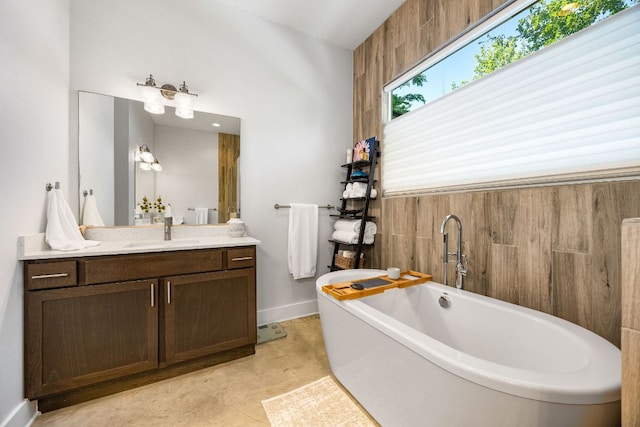2100 E 10th St, Austin, TX 78702 - bathroom featuring a freestanding tub and vanity