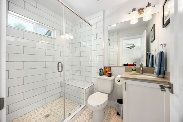 2100 E 10th St, Austin, TX 78702 - full bath featuring a ceiling fan, vanity, and a stall shower