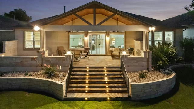 218 Duck Creek Ln, Georgetown, TX 78633 - rear view of house featuring a patio area and stucco siding