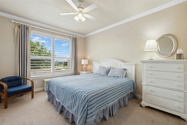 218 Duck Creek Ln, Georgetown, TX 78633 - bedroom featuring light colored carpet, ornamental molding, baseboards, and a ceiling fan