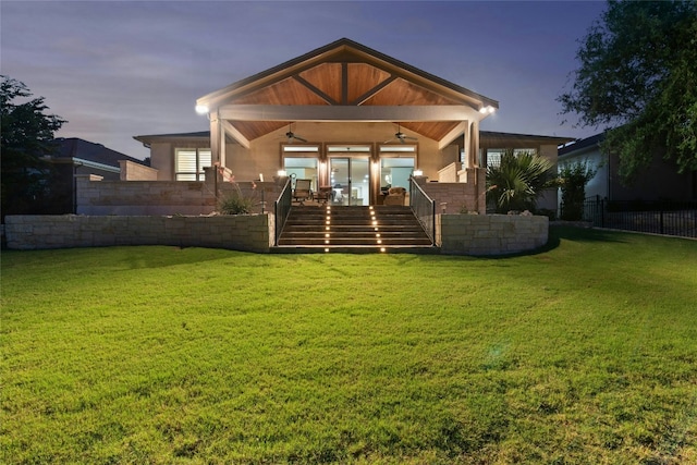 218 Duck Creek Ln, Georgetown, TX 78633 - rear view of house featuring ceiling fan, stairway, and stucco siding