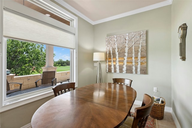 218 Duck Creek Ln, Georgetown, TX 78633 - dining room featuring plenty of natural light, ornamental molding, and baseboards