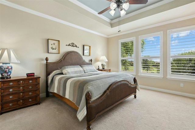 218 Duck Creek Ln, Georgetown, TX 78633 - bedroom featuring light colored carpet, a raised ceiling, ornamental molding, baseboards, and a ceiling fan