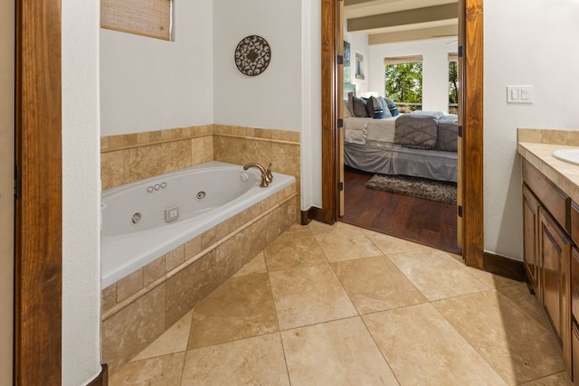 2804 Lohmans Ford Rd Unit B, Lago Vista, TX 78645 - ensuite bathroom featuring vanity and a jetted tub