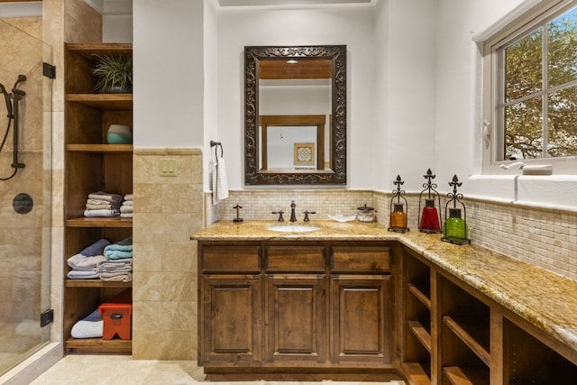2804 Lohmans Ford Rd Unit B, Lago Vista, TX 78645 - bathroom with vanity, a tile shower, and a wainscoted wall