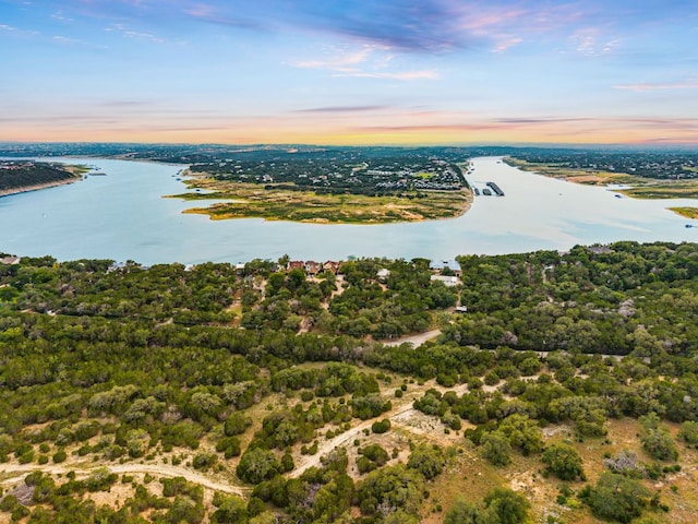 2804 Lohmans Ford Rd Unit B, Lago Vista, TX 78645 - aerial view at dusk of a water view and a forest view