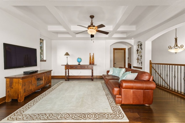 2804 Lohmans Ford Rd Unit B, Lago Vista, TX 78645 - living area featuring coffered ceiling, a ceiling fan, dark wood finished floors, arched walkways, and beamed ceiling