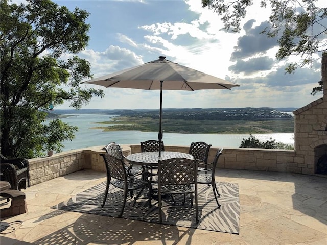 2804 Lohmans Ford Rd Unit B, Lago Vista, TX 78645 - view of patio / terrace featuring a water view and outdoor dining area