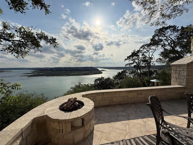 2804 Lohmans Ford Rd Unit B, Lago Vista, TX 78645 - view of patio with a water view and an outdoor fire pit