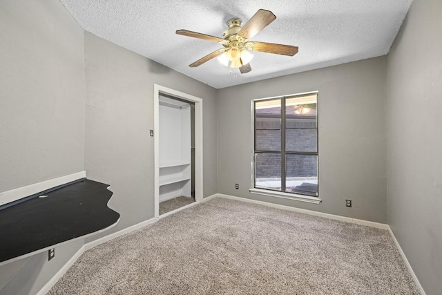 1008 Woodshadows Dr, Harker Heights, TX 76548 - spare room with carpet floors, ceiling fan, a textured ceiling, and baseboards