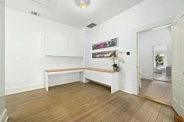 1112 W 10th St, Austin, TX 78703 - unfurnished office featuring light wood-style flooring and baseboards
