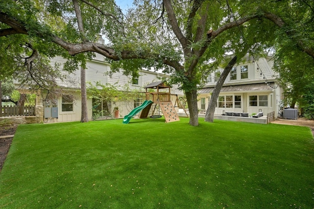 1112 W 10th St, Austin, TX 78703 - view of yard featuring a playground and central AC unit
