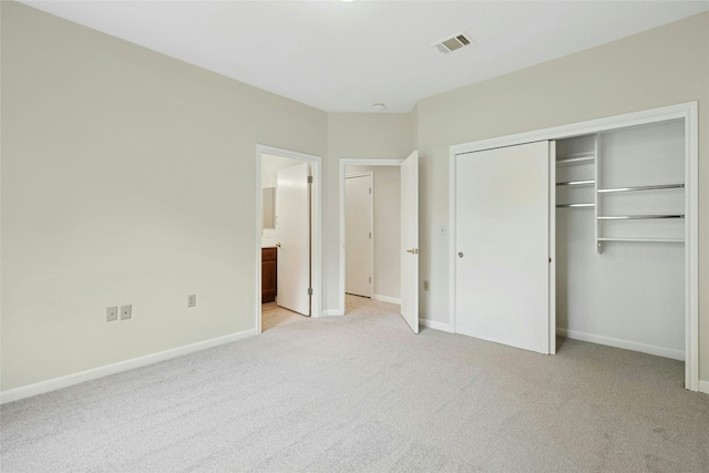 112 Anemone Way, Georgetown, TX 78633 - unfurnished bedroom with light carpet, baseboards, a closet, and connected bathroom