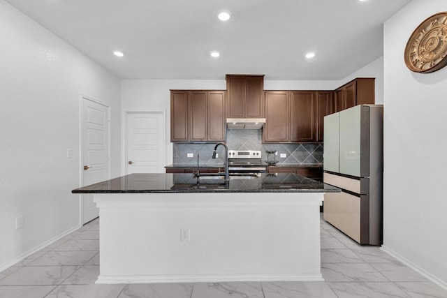 14516 Isidors Eagle Way, Elgin, TX 78621 - kitchen featuring freestanding refrigerator, light marble finish floors, a sink, under cabinet range hood, and recessed lighting