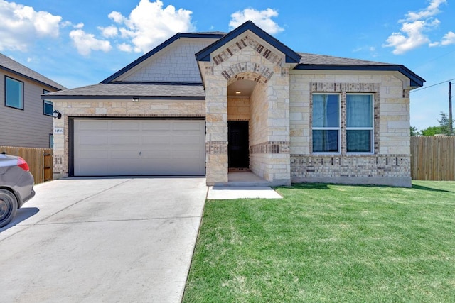 14516 Isidors Eagle Way, Elgin, TX 78621 - french country style house with driveway, stone siding, and an attached garage