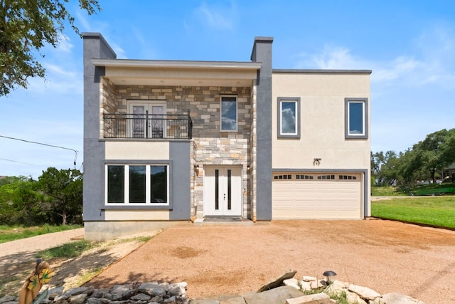 757 Canyon Bnd, Canyon Lake, TX 78133 - view of front facade with a balcony, a chimney, stone siding, and driveway