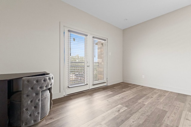 757 Canyon Bnd, Canyon Lake, TX 78133 - unfurnished living room featuring wood finished floors