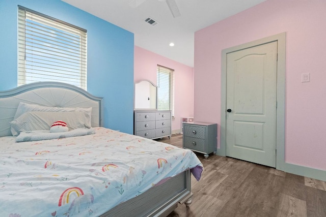 757 Canyon Bnd, Canyon Lake, TX 78133 - bedroom featuring wood finished floors, a ceiling fan, and recessed lighting
