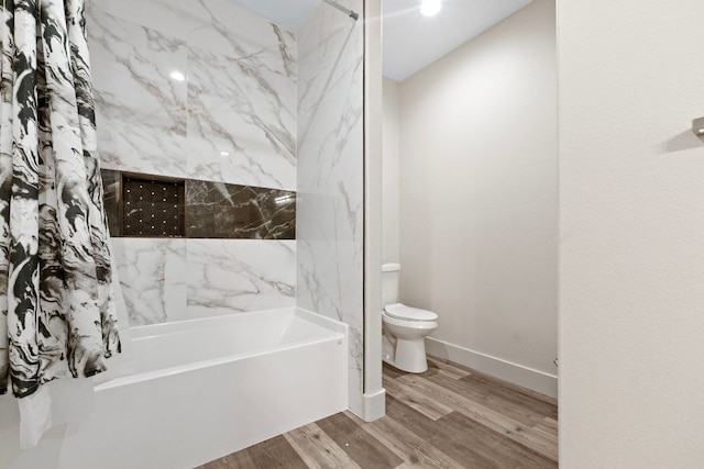 757 Canyon Bnd, Canyon Lake, TX 78133 - bathroom featuring wood finished floors and bathtub / shower combination