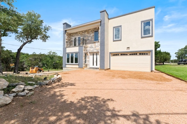 757 Canyon Bnd, Canyon Lake, TX 78133 - modern home with driveway, a garage, a balcony, and stucco siding