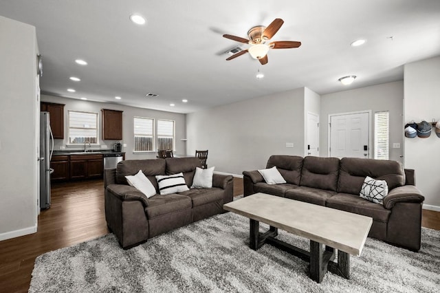 328 Triumph Rd, Buda, TX 78610 - living room featuring dark wood-type flooring, ceiling fan, recessed lighting, and baseboards