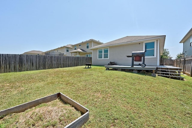 328 Triumph Rd, Buda, TX 78610 - view of yard with a deck and a vegetable garden