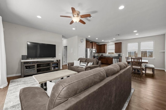 328 Triumph Rd, Buda, TX 78610 - living room with a ceiling fan, baseboards, dark wood-style floors, and recessed lighting